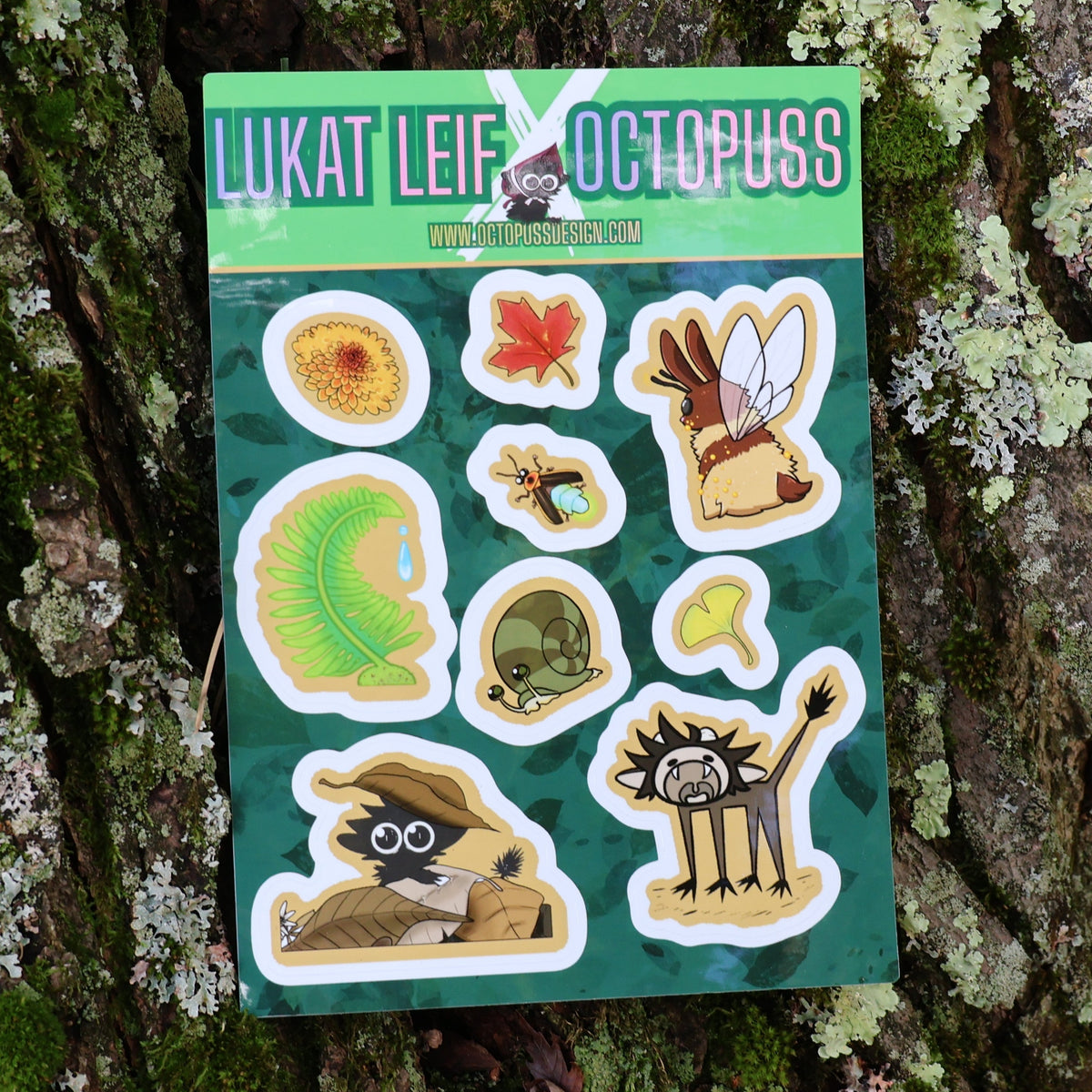 Sticker sheet featuring baby cryptids, leaves, and small bugs