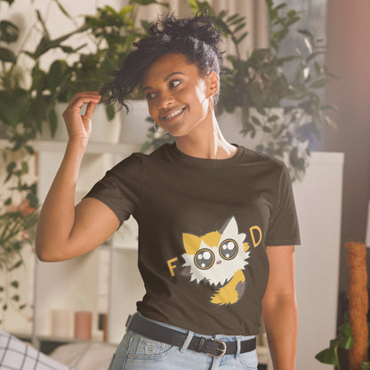 Woman wearing a black t-shirt with a cartoon character design, standing in a room with plants.