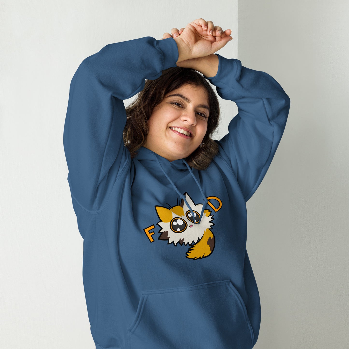 Person wearing a blue hoodie with a cartoon cat character on a plain background