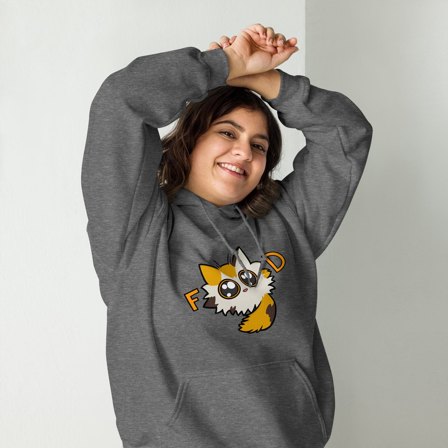 Person wearing a gray hoodie with a cartoon cat character on a plain background