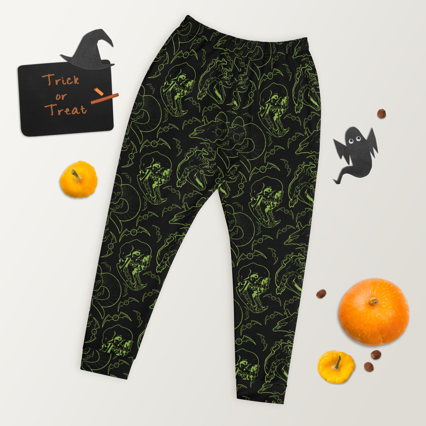 black joggers with a neon green skull pattern.