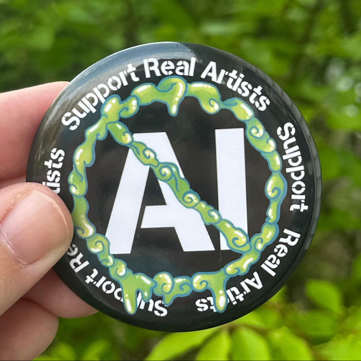 Hand holding a circular object with  no AI text against a green leafy background