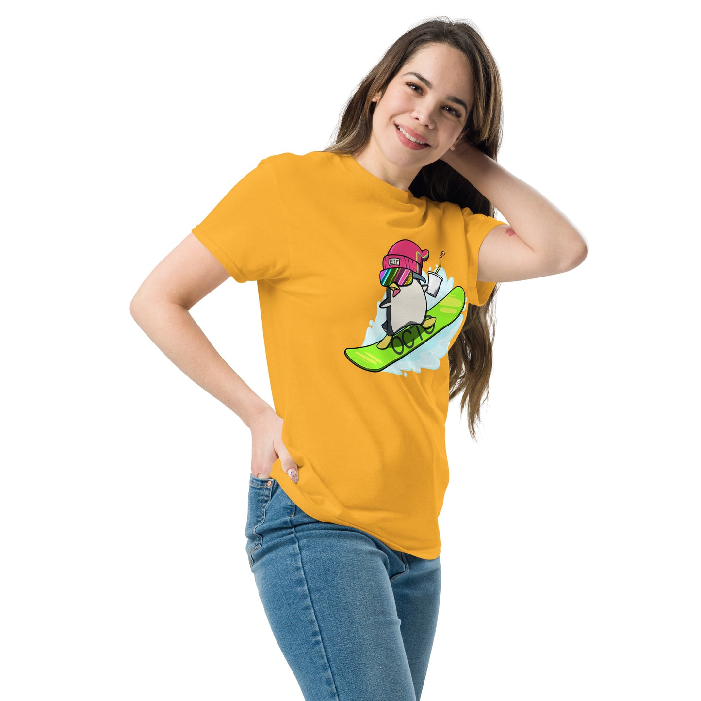 Person standing featuring a tshirt with a snowboarding penguin cartoon image on it.