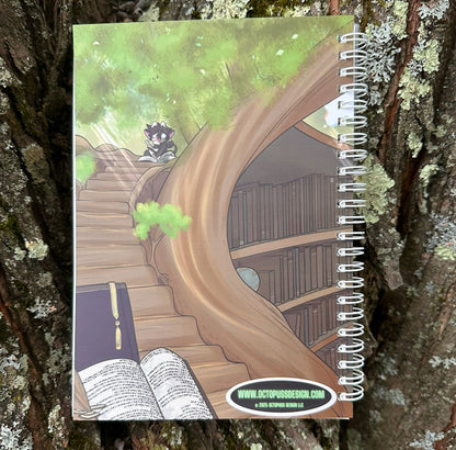 Notebook with a treehouse illustration on a tree trunk
