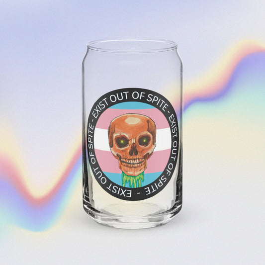 Skull on a transgender pride flag encircled by text ‘exist out of spite’ on a can shaped glass.